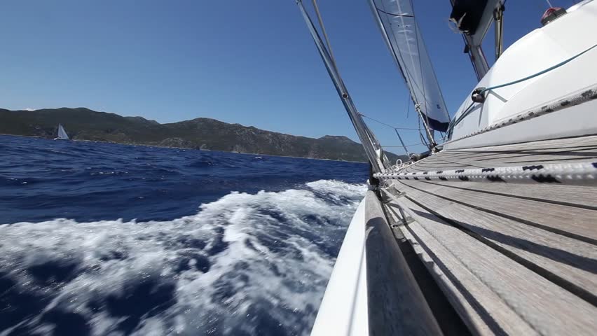 Sailing Boat In The Wind Through The Waves, Shot In Full Hd. Stock 