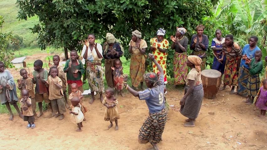 LAKE BUNYONYI, UGANDA - OCTOBER 21, 2012: Batwa Pygmies Dancing On ...