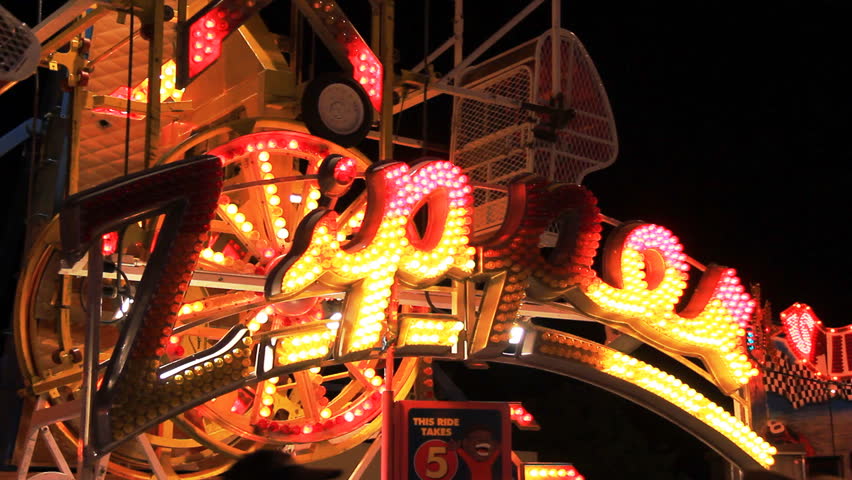 The Zipper Carnival Ride Spins Against The Sky During The 2014 New ...