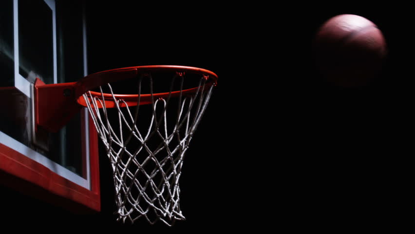 Close Up Of A Basketball Hitting The Rim Of The Hoop And Bouncing Away ...