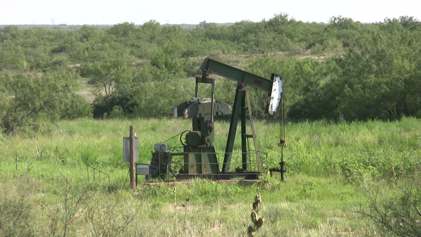 Oil Donkey Pumping Oil In A Texas Field Stock Footage Video 514897 ...