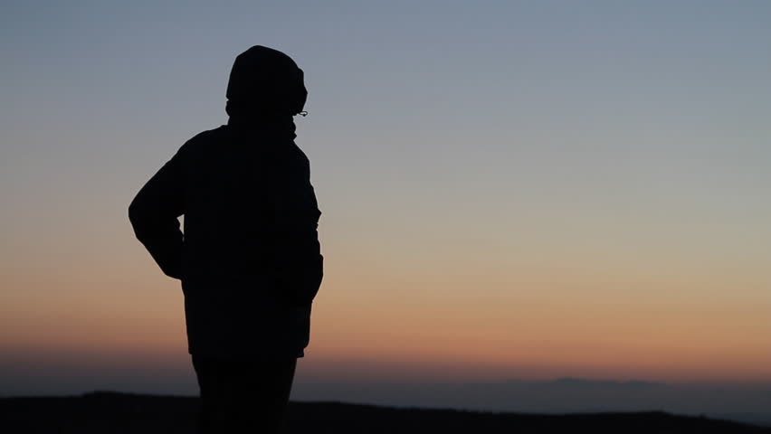 Silhouetted Man Standing In Sunset On Mountain Stock Footage Video ...