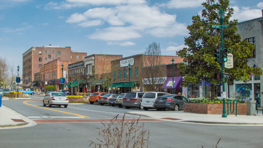 Vehicle Traffic down Main Street in the Historic Downtown of the City ...