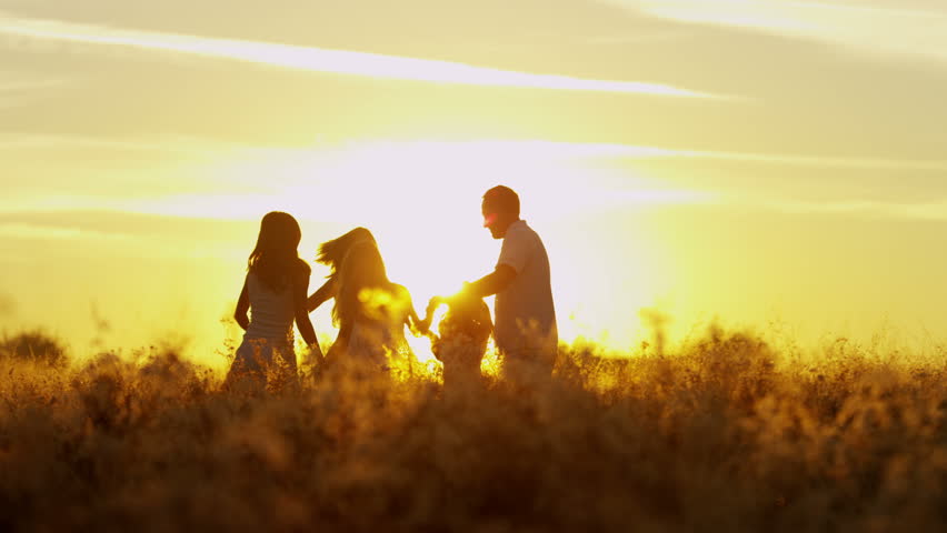 Happy Young Heterosexual Caucasian Family Daughters Sunset Silhouette ...