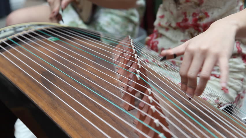 Chinese Girl Playing The National Instrument Stock Footage Video ...