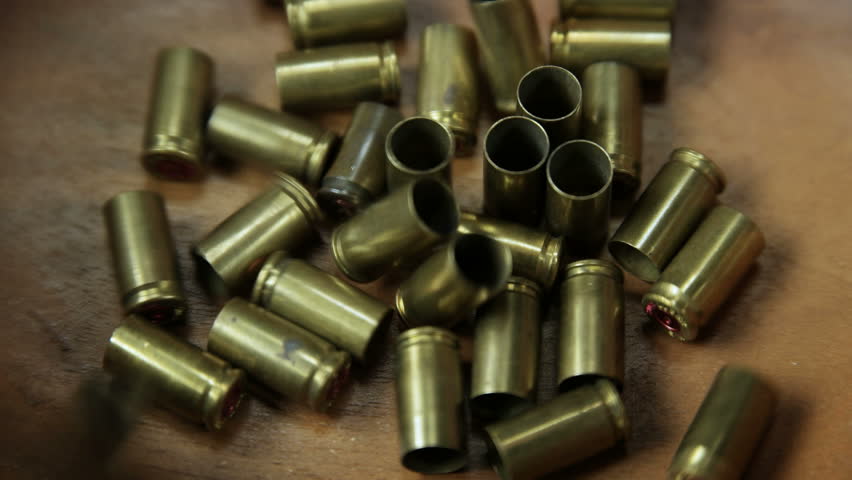 Bullet Casings Falling Into Group 4K UHD Stock Footage Video 9705653 ...